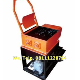 Mesin Pengupas Sabut Kelapa